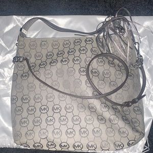 Pre loved Michael kors shoulder/crossbody bag. Very clean. Mk monogram.
